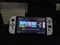 Nintendo Switch OLED + Zelda Breath Of The Wild