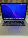 MacBook Pro 15" (mid-2015) — 16GB RAM, 1TB SSD, 2.2 GHz.