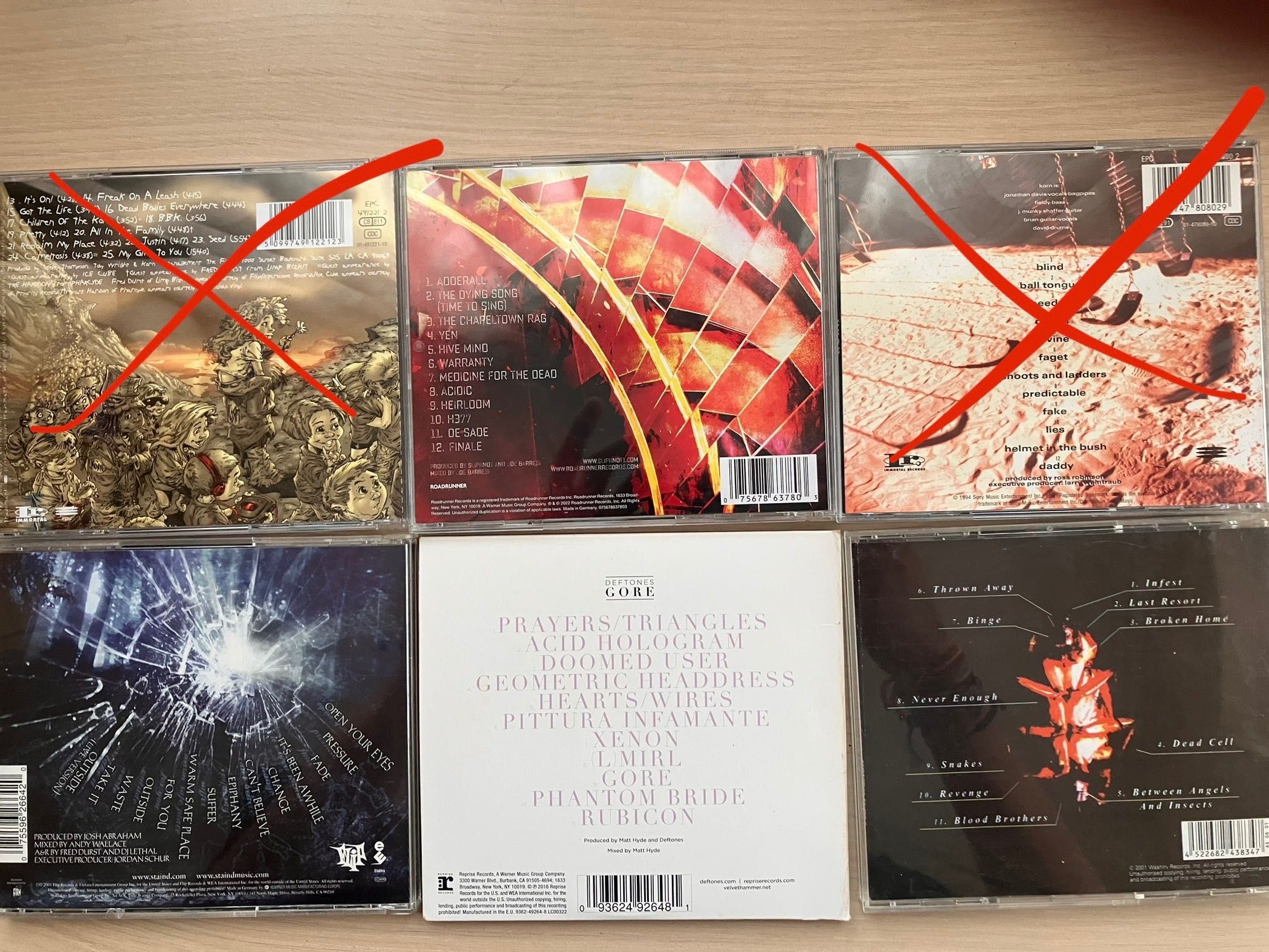 CD-та оригинални на korn, deftones, staind, papa roach, reef, slipknot