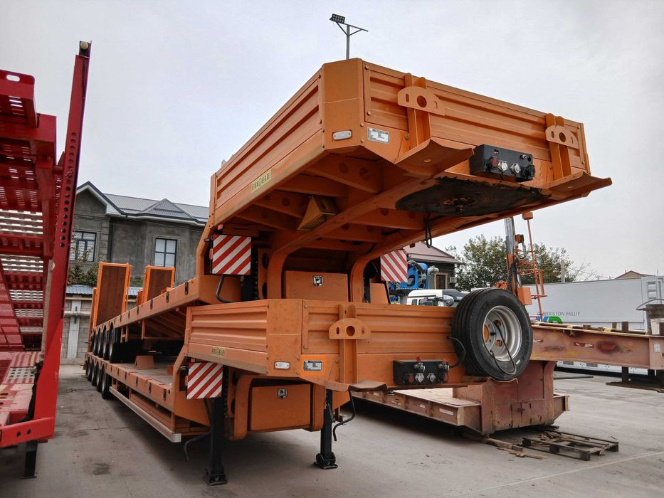 Низкопольный полуприцеп тяжеловоз (трал) грузоподъемностью 53 т