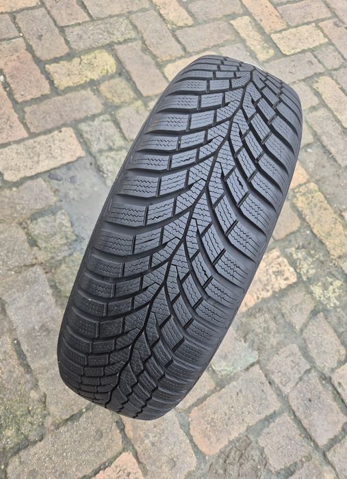 O bucată 195/65 R15 M+S iarnă - una Continental