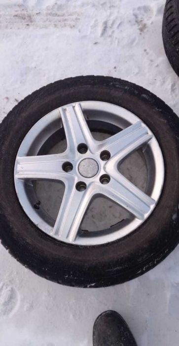 Продам диски титановые с резиной комплект