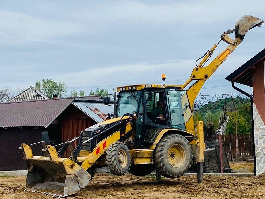 Caterpillar 428D Dezmembrez buldoescavator 428D