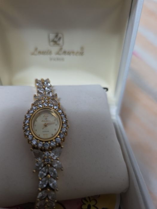 Часы дизайнерские позолоченные