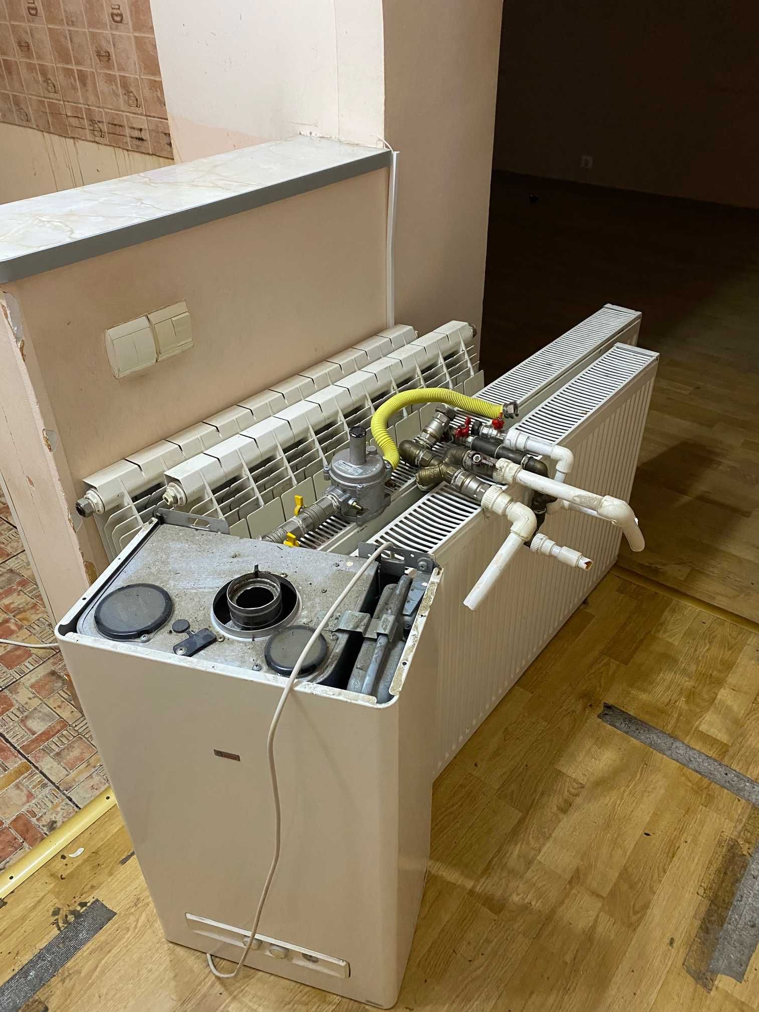 Centrala termica 24 kw, calorifere aluminiu și oțel
