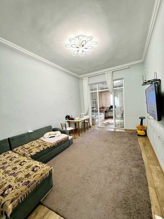 Продается 2х ком высокопотолочка 60кв ул.Навои ТЮЗ