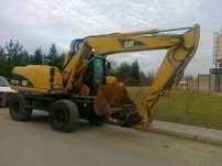 dezmembram excavator pe roti caterpillar m 313 ult-05671