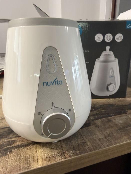 Нагревател за шишета Nuvita