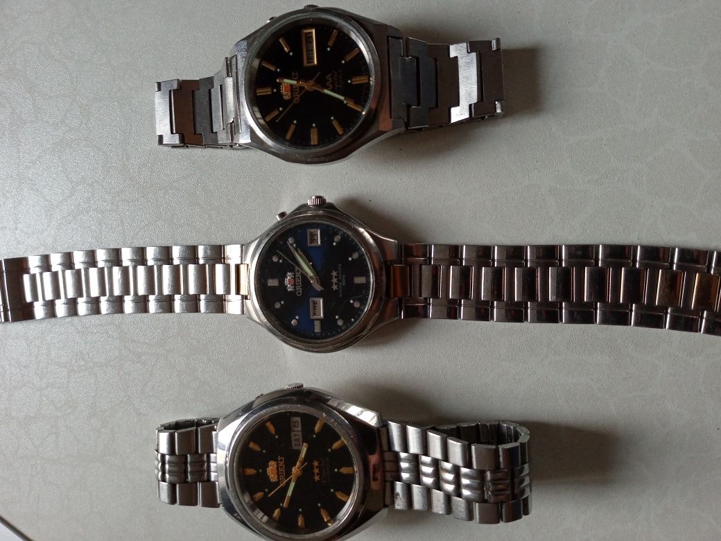 Часы Ориент оригинал автоподзавод родные браслеты цена за одни часы .