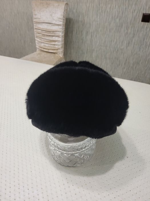 Шапку ушанку в отличном состояние