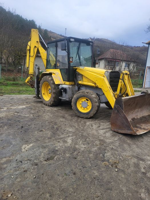 Vand buldoexcavator mf 750