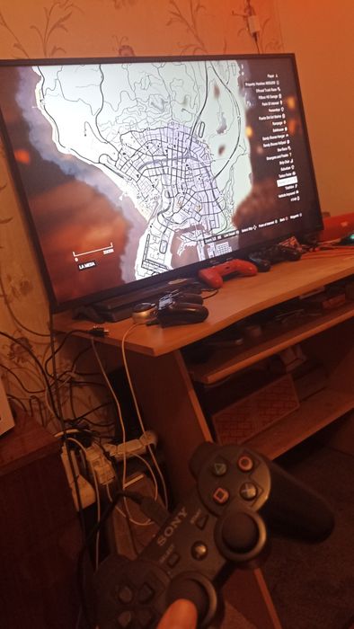 PS3 slim с 2 игри