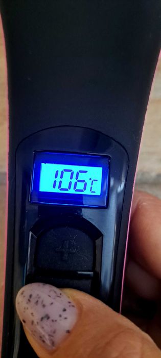 Електрическа четка за изправяне на коса.