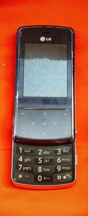 LG KF510 + accesorii originale LG ( decodat,lb română)