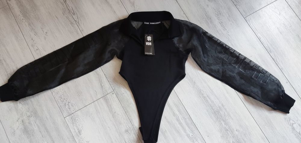 Боди на марката Paus