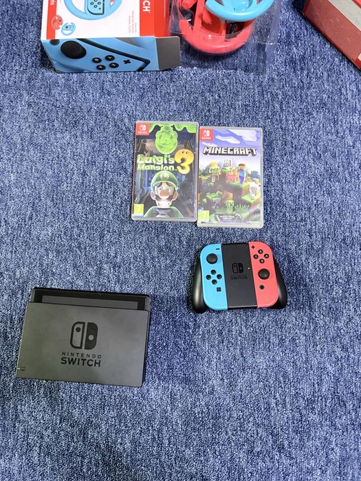 Vand nintendo switch+2 jocuri,negociabil