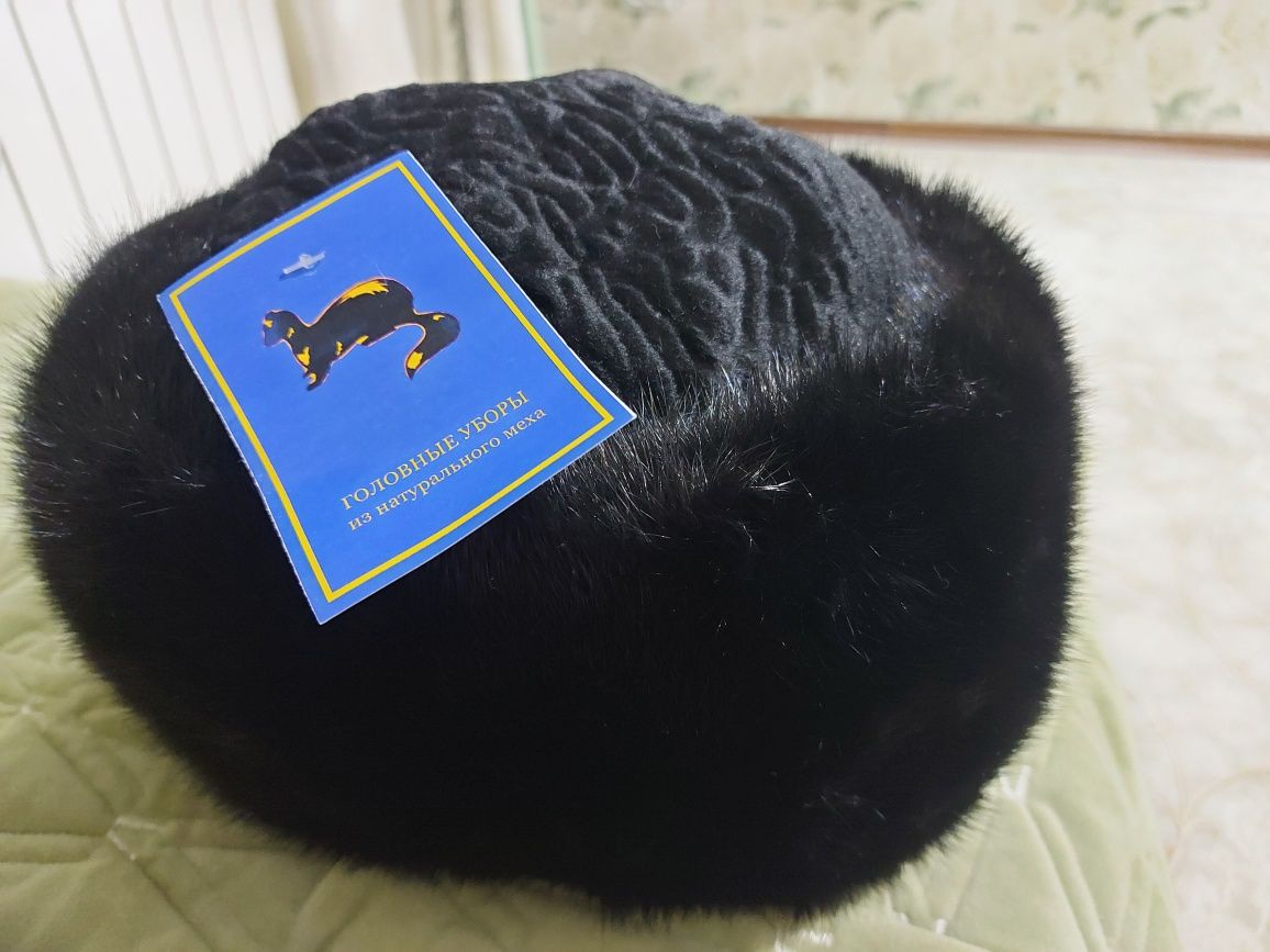 Продам зимию шапку