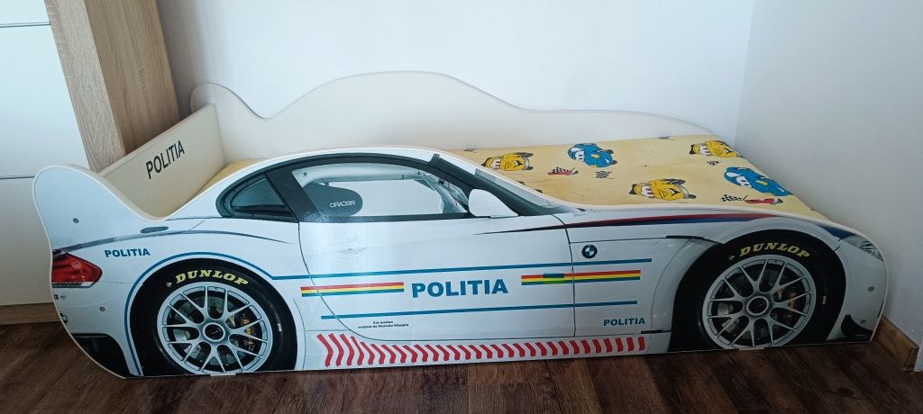 Pat copii mașină poliție