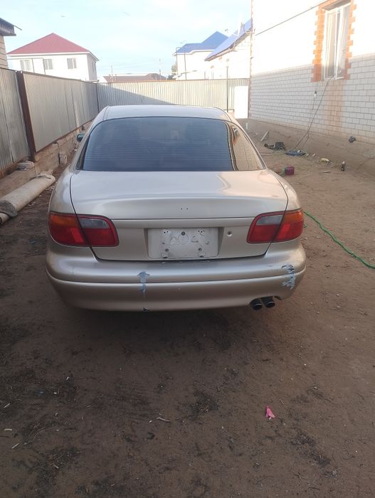 Мазда миления 1998года