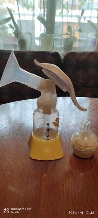 Ръчна двуфазна помпа за кърма Medela harmony .