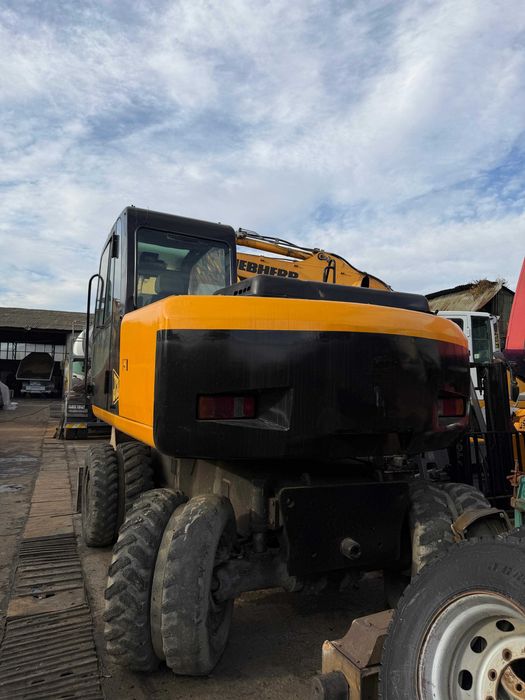 Excavator pe roti JCB JS145