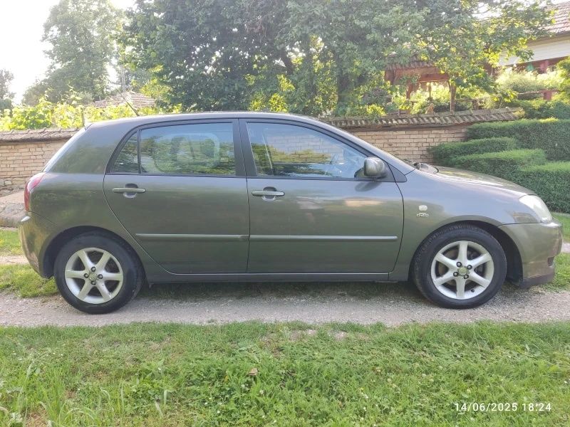 Тойота Corolla 2003
