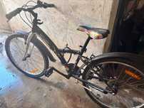 Bicicletă  B-Twin copii 24" in stare nouă,  cu sistem Shimano