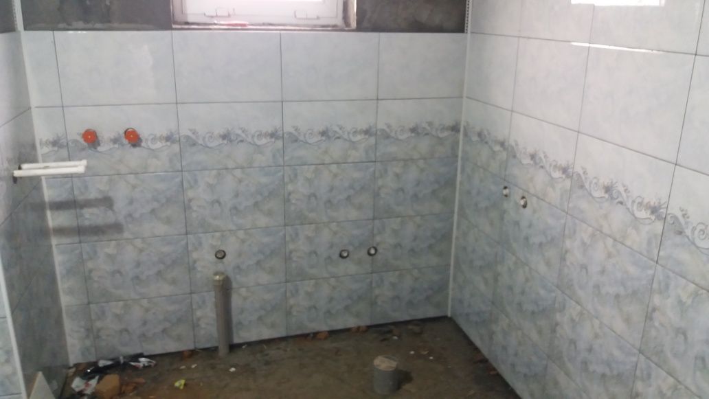 Malyar shpaklopka obiy gipsokarton kafel