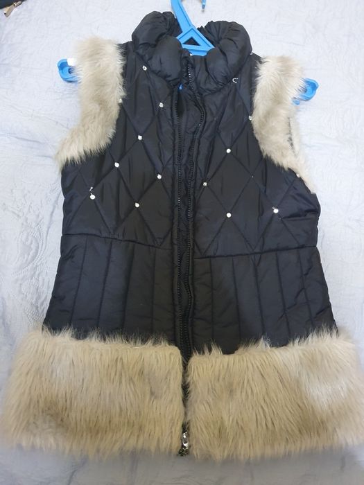 Продам жилетку на девочек 8-13лет