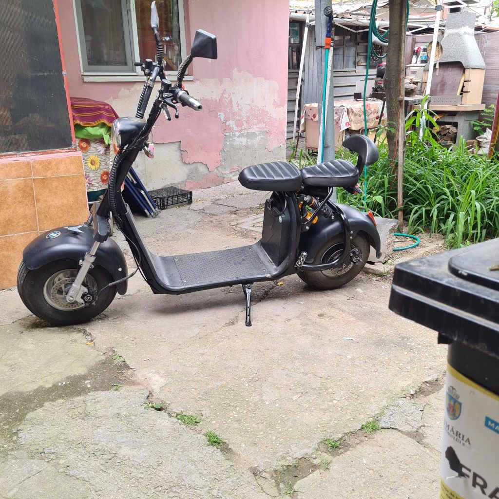 vand scuter electric