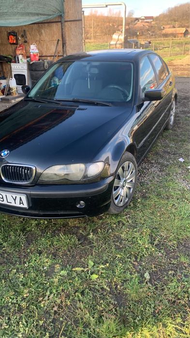 BMW SERIA 3/E56  cu trapa