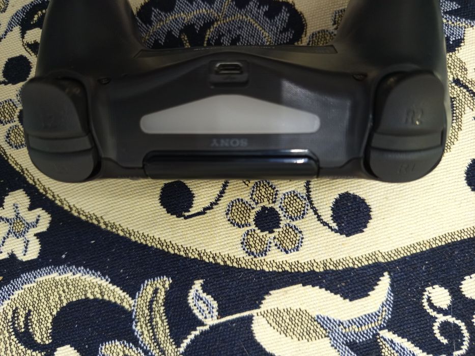 Геймпад Playstation 4 Dualshock 4 подробно в описаний