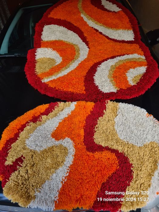 Vand  covoare frumoase putin folosite