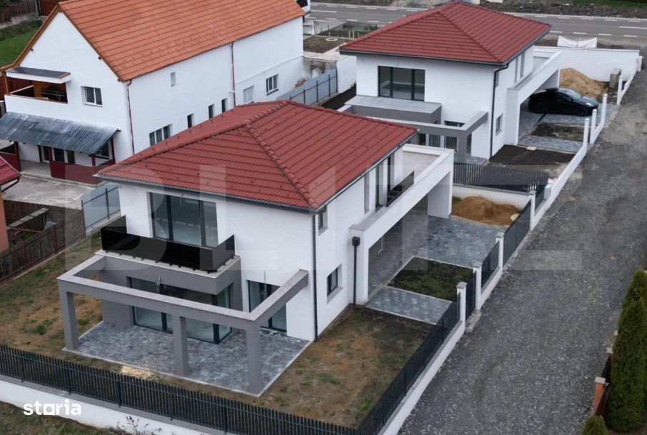 Casa individuala moderna, cu garaj, la intrare in Chinteni