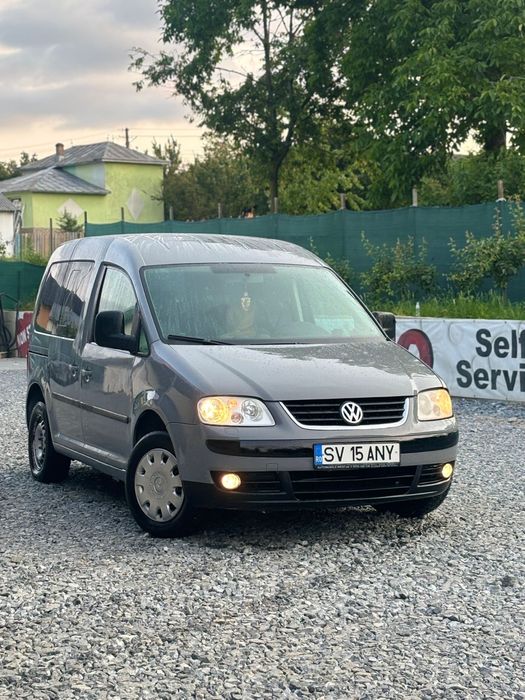 Vand vw kaddy cu 7 locuri 2005 gaz+ benzina
