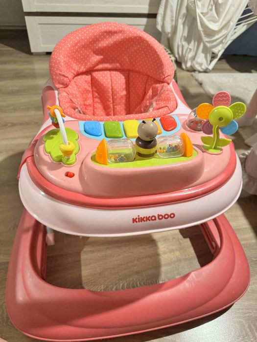 Premergător Kikka Boo roz cu jucării muzicale – stare excelentă