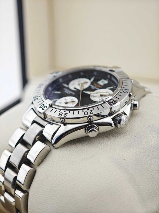 Breitling Colt Chronograph 
и Versace Aion 
A53035