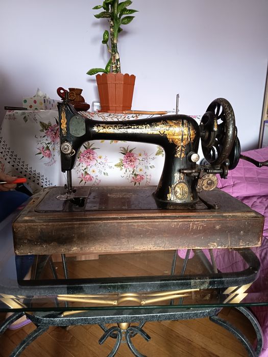 Mașină de cusut Singer