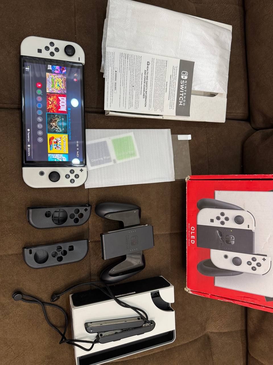 Продаю Nintendo switch oled как новый с играми