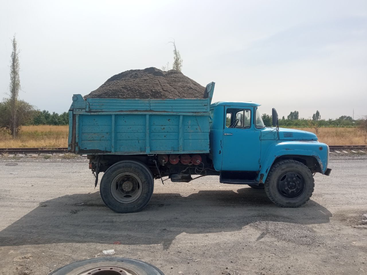 Самосвал хизмати Фаргона Шахар буйлаб кум шагал митипесок Тош ташиш.