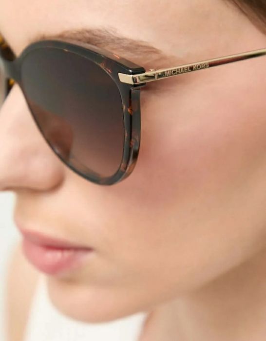 Vand ochelari Michael Kors și Police