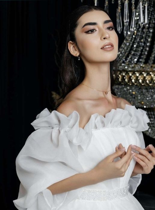 Свадебное платье очень нежно смотрится