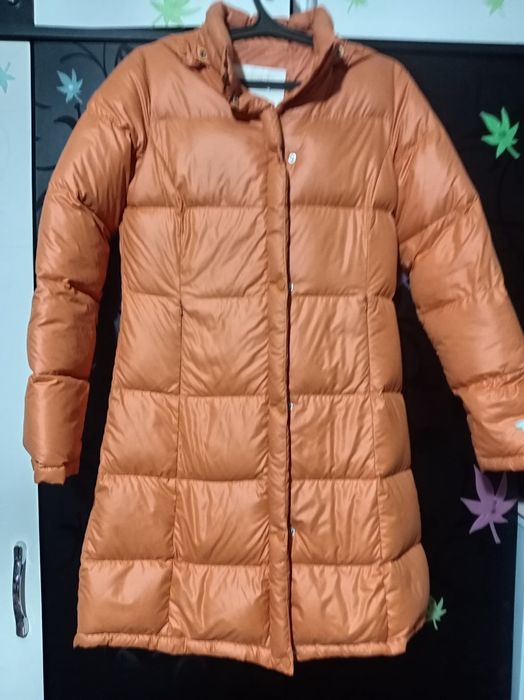 Продам пуховик. Привезли из Германии. Одет один раз. Размер не подошел