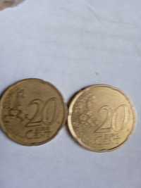Doua monede rare de 50 eurocenți din 2002 vând.