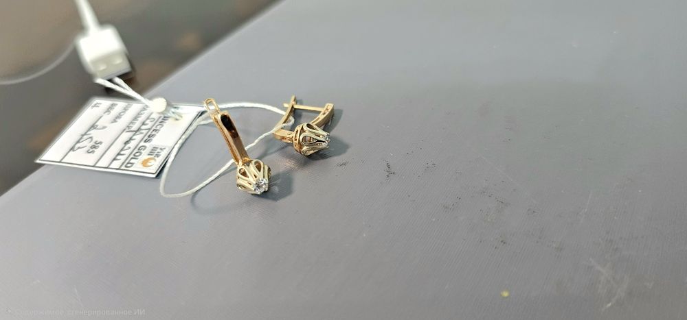 Золотое серьги розочка