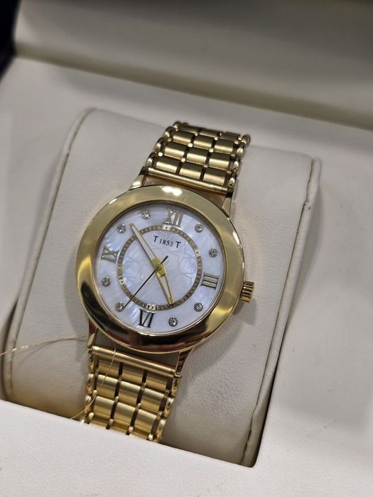 Продам классические часы Tissot в золоте 750 пробы