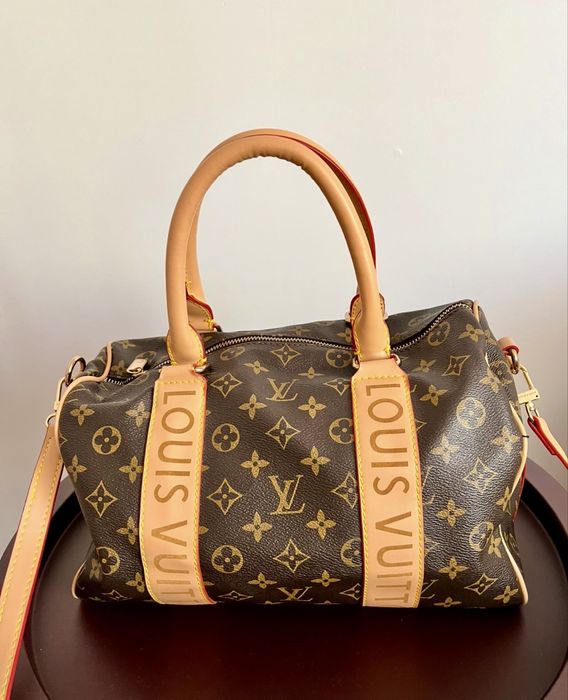 Geanta de umar Louis Vuitton