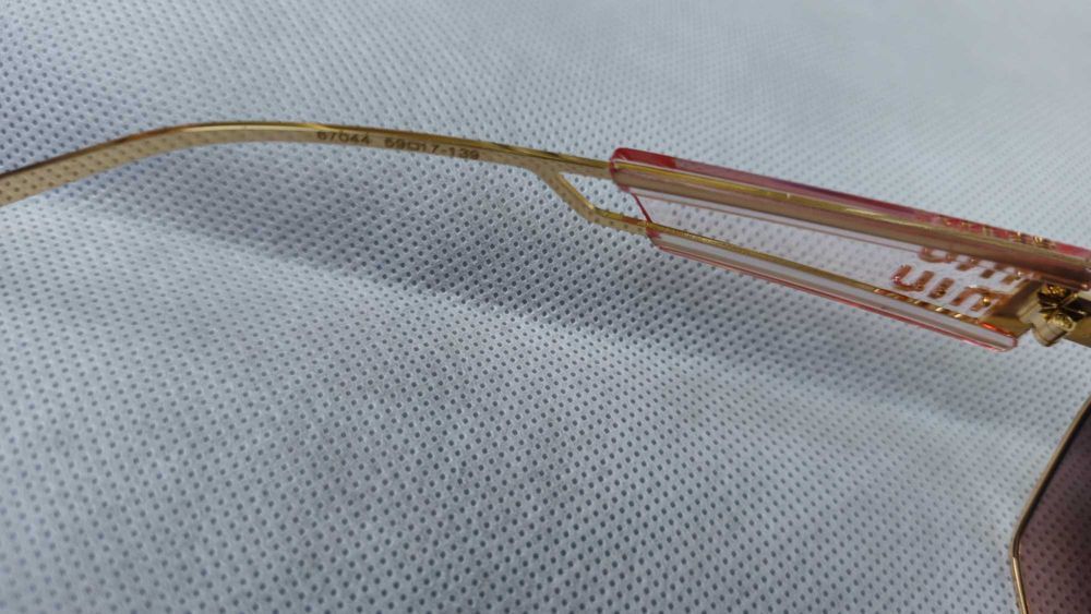 Ochelari de soare Miu Miu lentila maro, rama aurie, brat transparent
