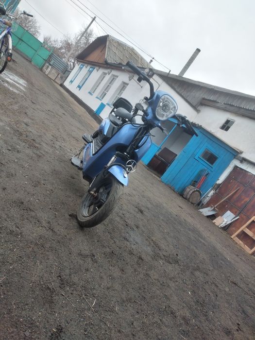 Электроскутер на ходу всё работает с торгом