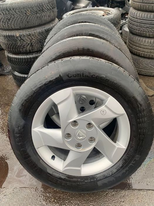 Vand set de jante aliaj cu cauciucuri Dacia Duster ET50 215/65/ R16, cod 5200810243